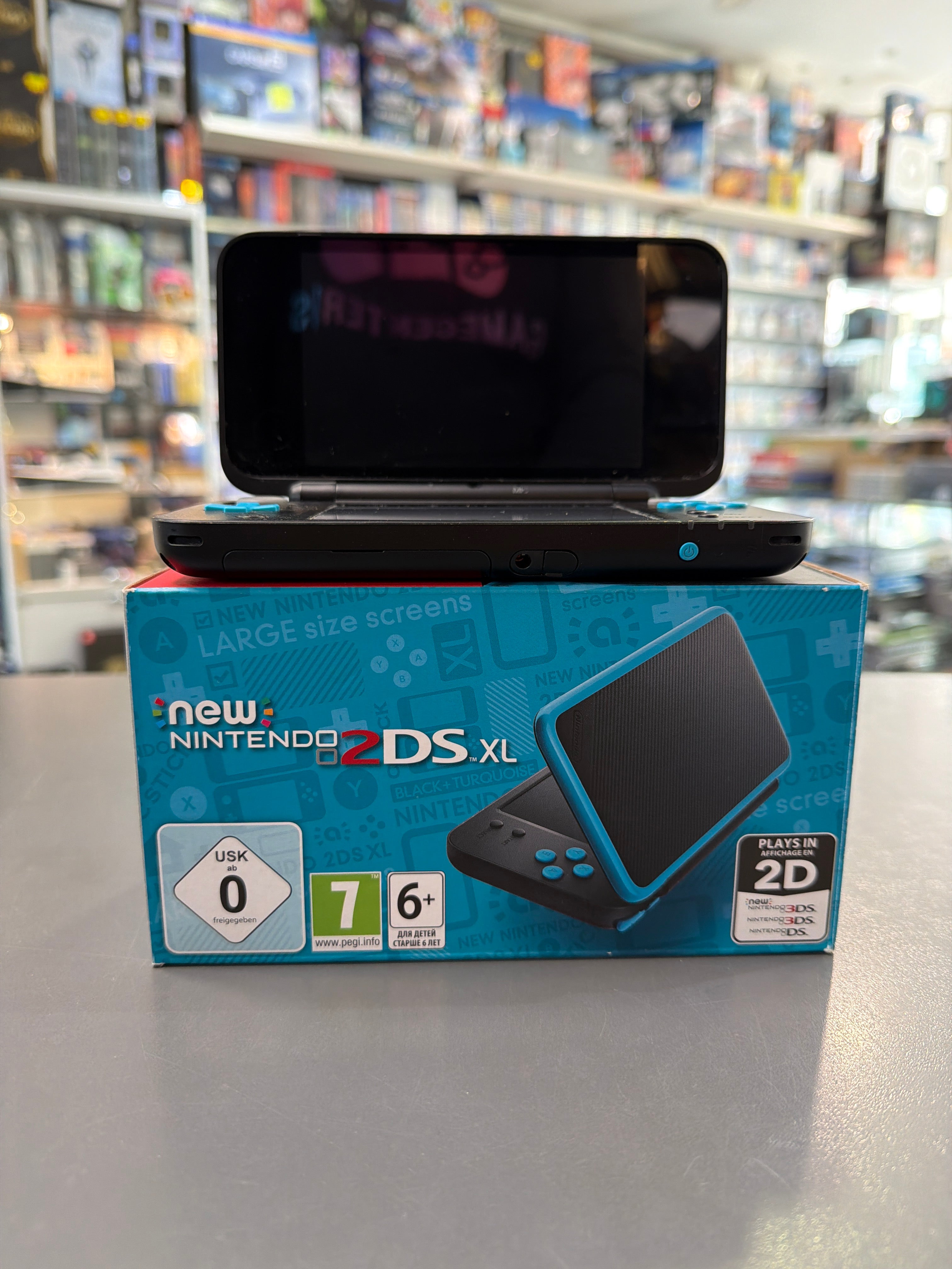 New Nintendo 2DS XL Schwarz + Türkis neuwertig *gebraucht