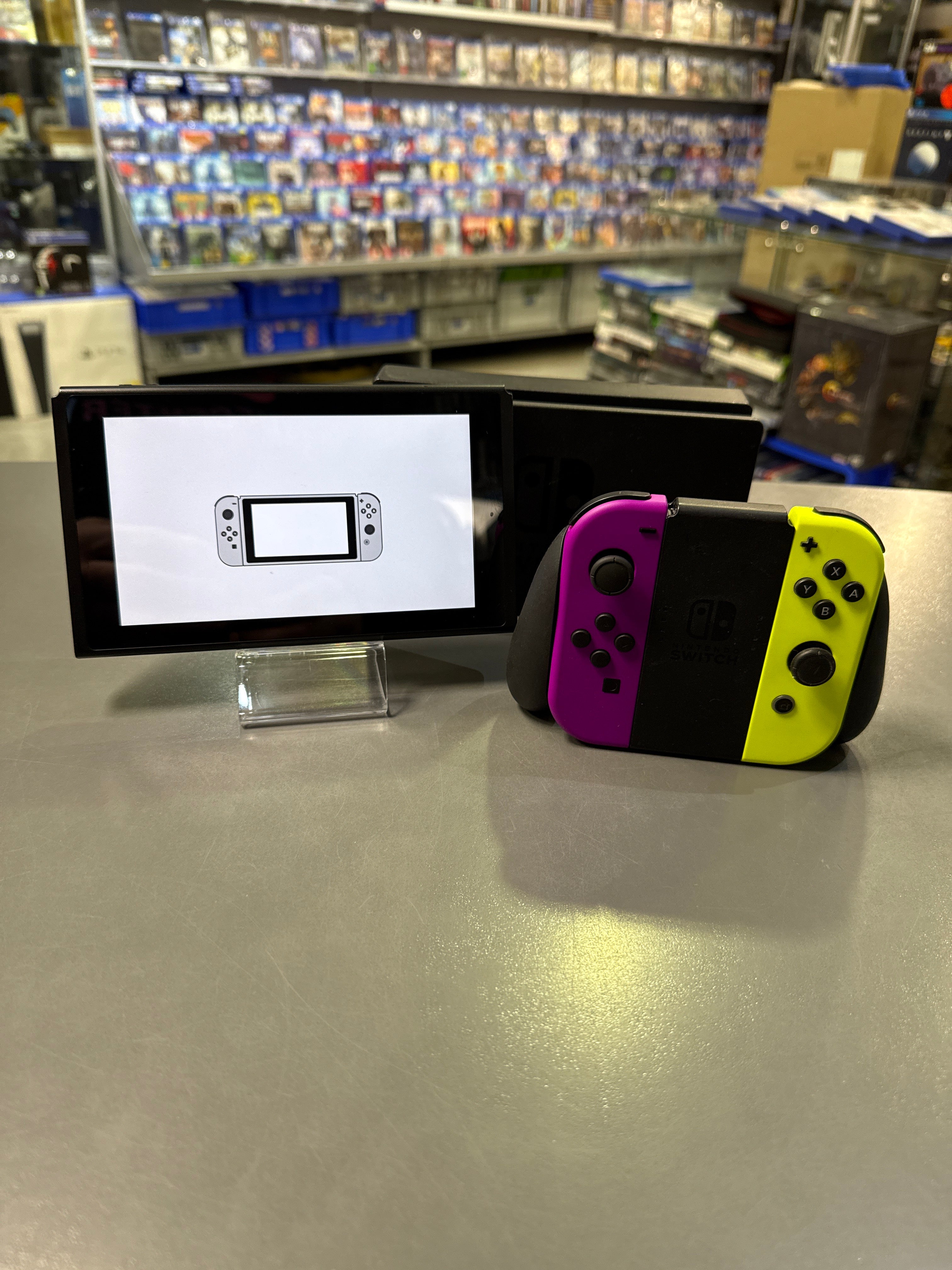 Nintendo Switch-Konsole mit Joy cons Neon-Lila/Neon-Orange *gebraucht*