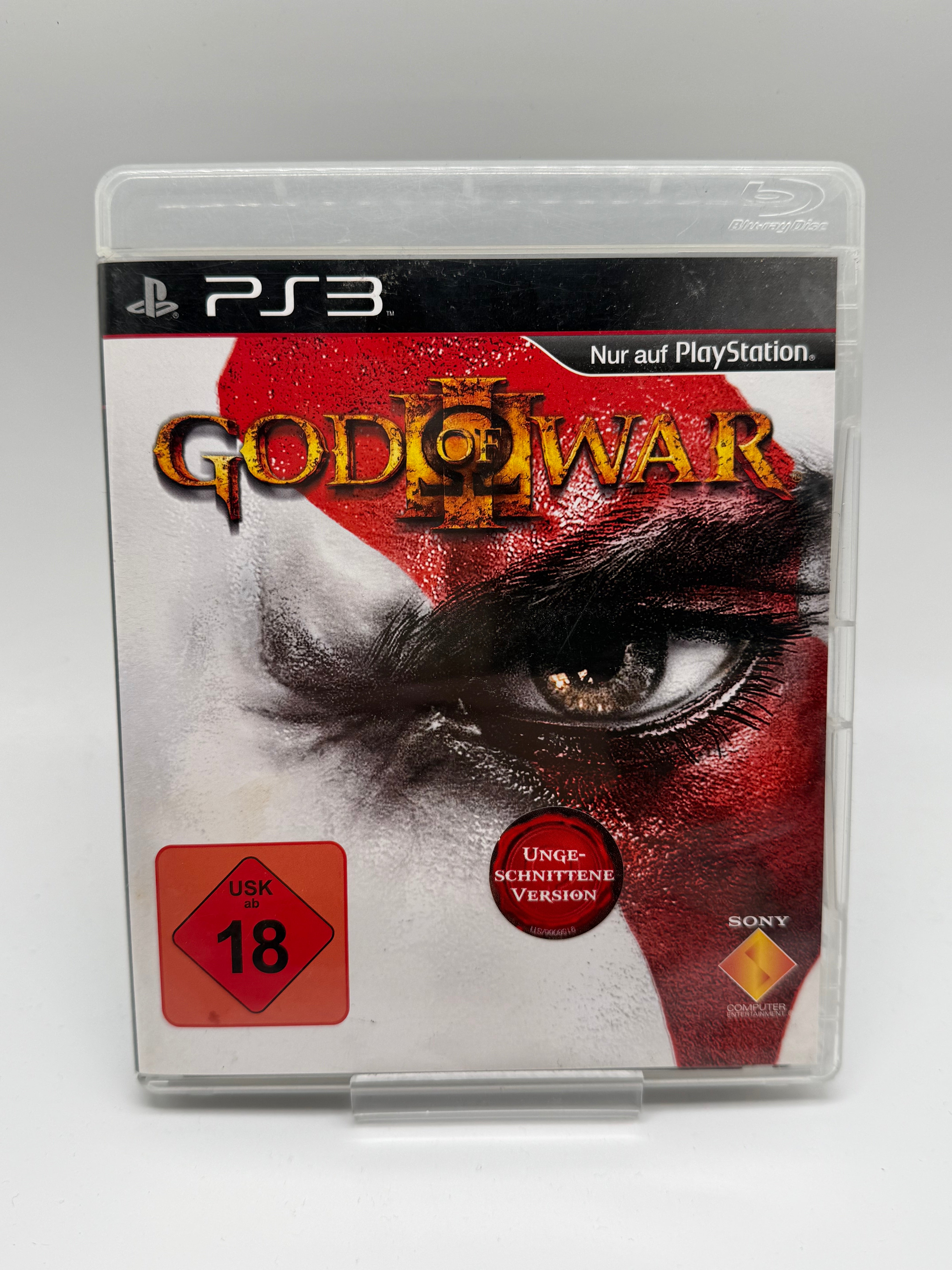 God of War III für PlayStation 3 mit Kratos in einer epischen Kampfszene gegen mythologische Götter.