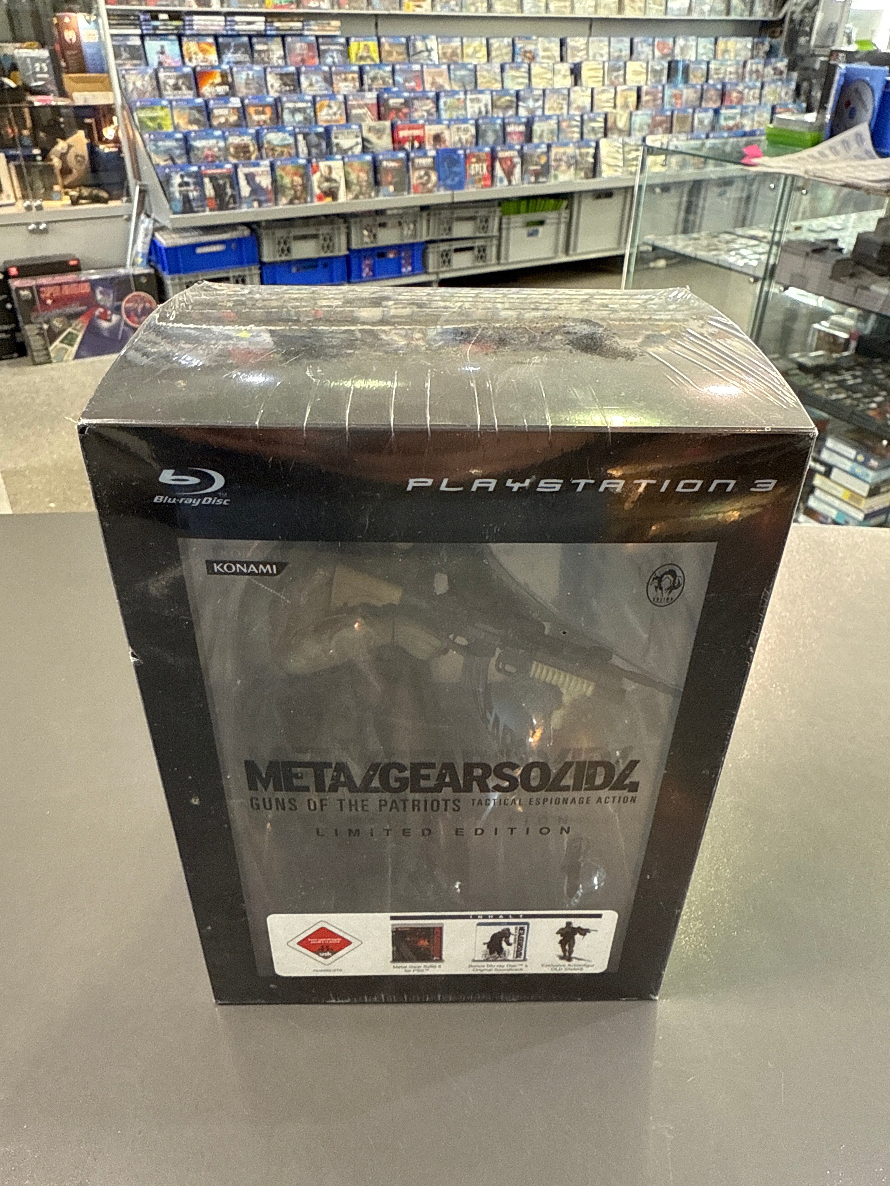 Metal Gear Solid 4: Guns of the Patriots Limited Edition für PlayStation 3, neu in Folie, mit ikonischem Solid-Snake-Artwork und militärischem Sci-Fi-Design.
