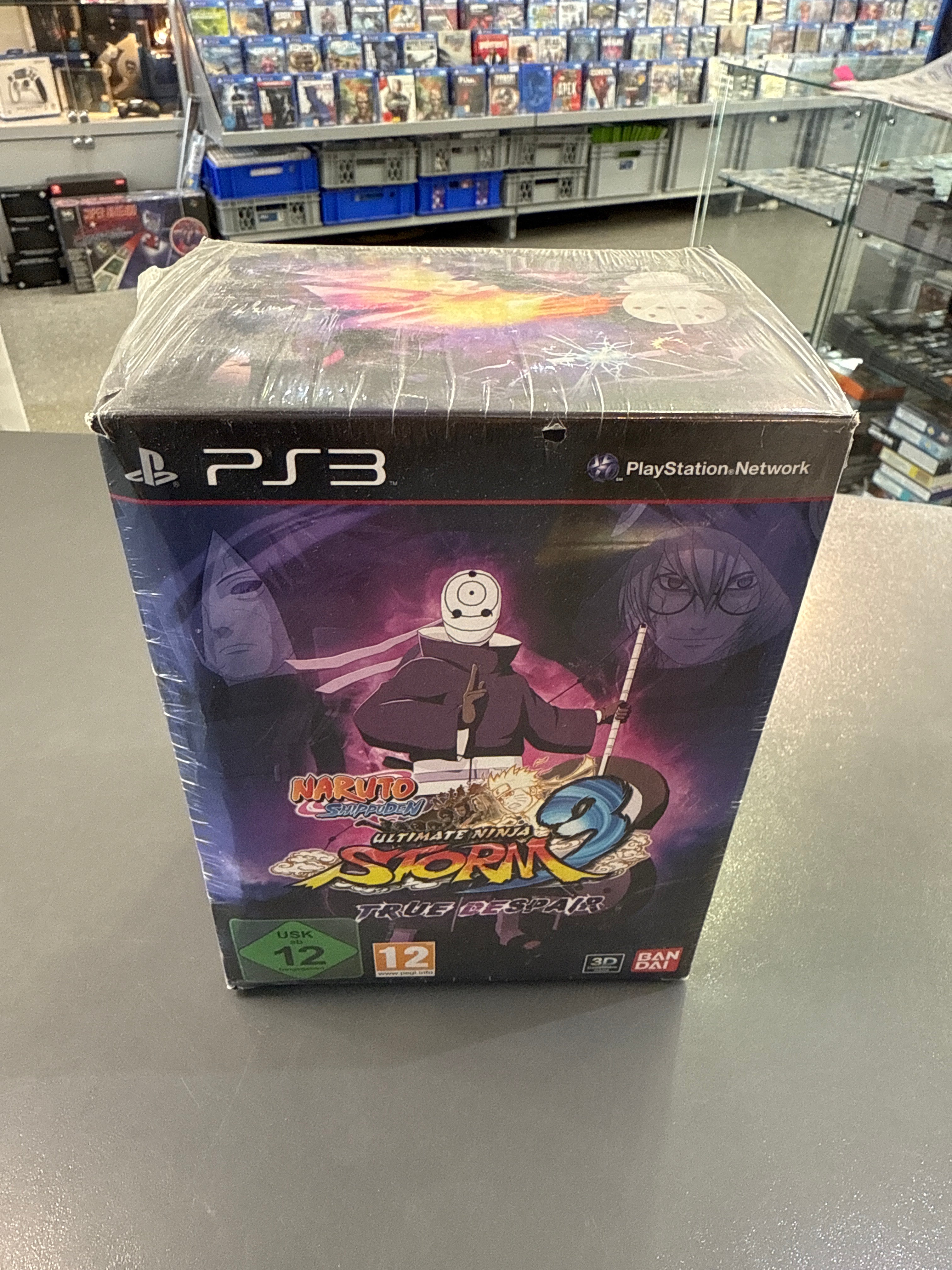 Naruto Shippuden: Ultimate Ninja Storm 3 True Despair Edition mit Naruto im Kampfmodus und dunklem Akatsuki-/Kriegshintergrund.