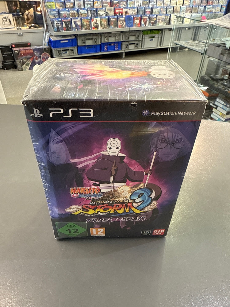 Naruto Shippuden: Ultimate Ninja Storm 3 True Despair Edition mit Naruto im Kampfmodus und dunklem Akatsuki-/Kriegshintergrund.