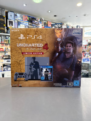 Gebrauchte PlayStation 4 Konsole mit 1TB Speicher in Grau-Blau inklusive Uncharted 4 A Thief’s End Edition Spiel, neuwertiger Zustand